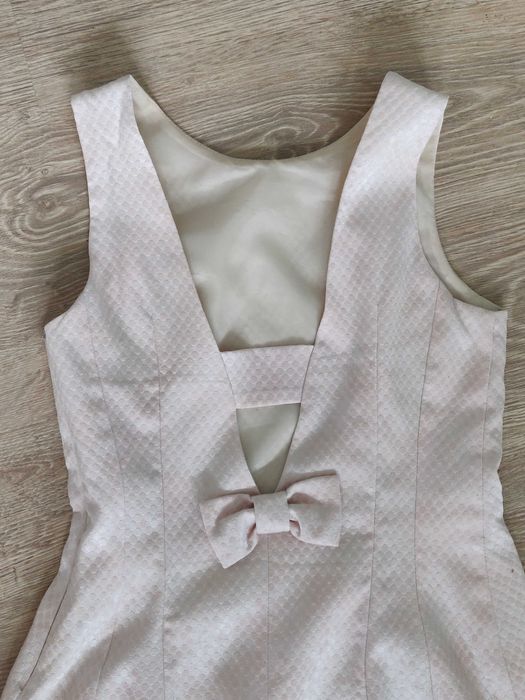 Sukienka z kokardą na plecach pudrowy róż Zofix 38 na wesele