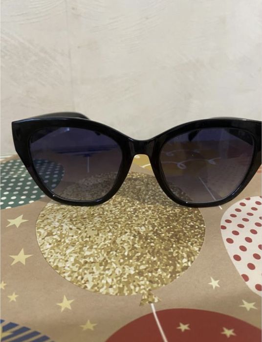 Жіночі сонцезахисні окуляри