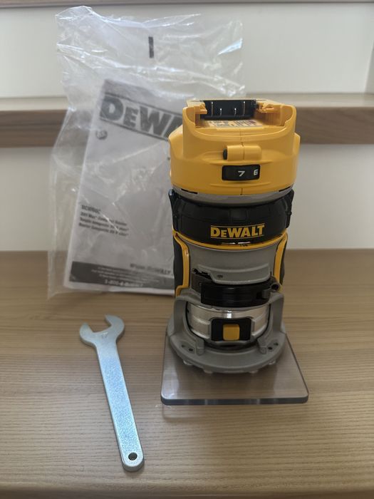 фрезер Dewalt dcw600