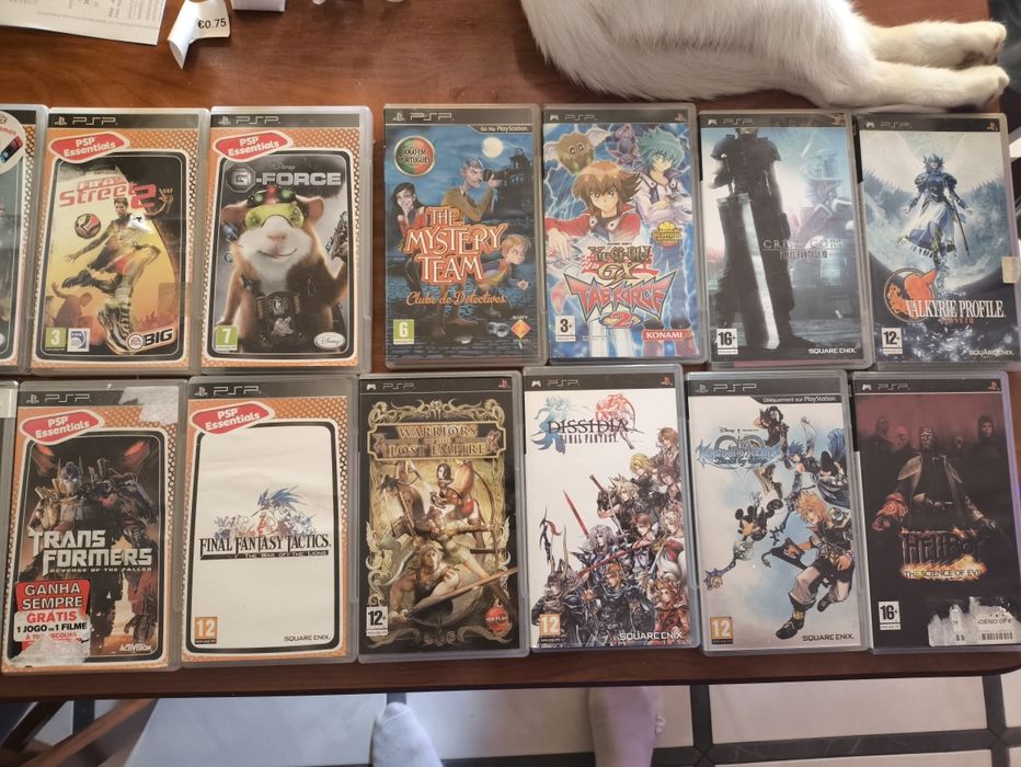 PSP 1001 + carregador + 46 jogos originais