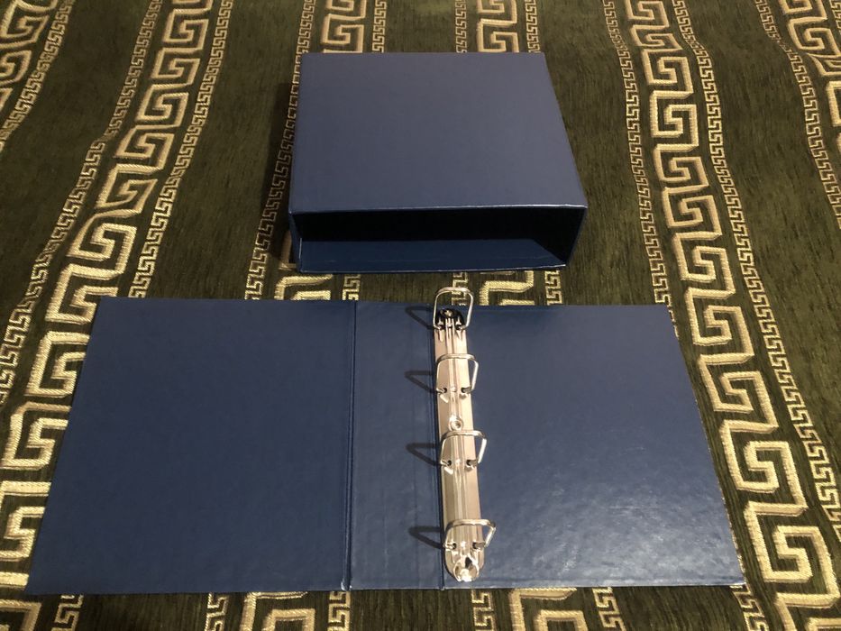 Альбом для монет, банкнот марок та іншого матеріалу