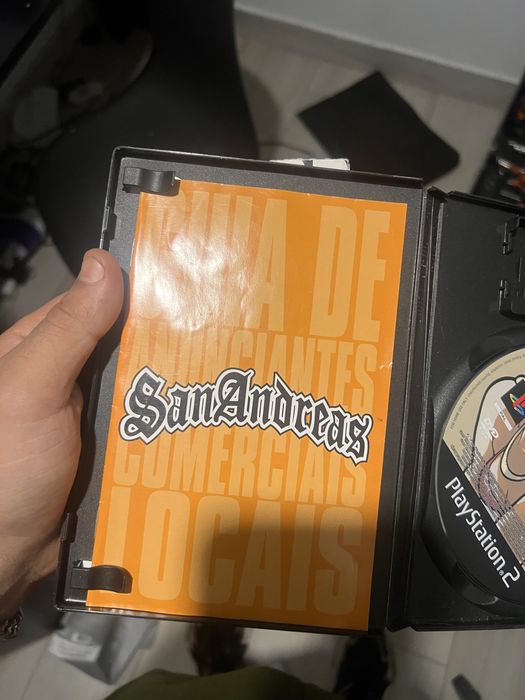 Ps2 com dois jogos e comando