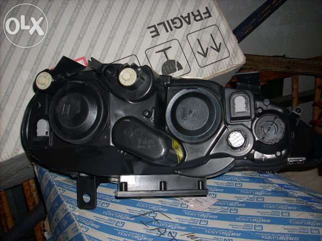Farol esq alfa 147 xenon
