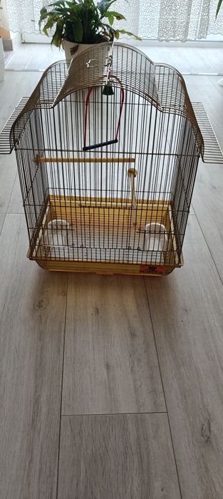 Клітка жля папугая