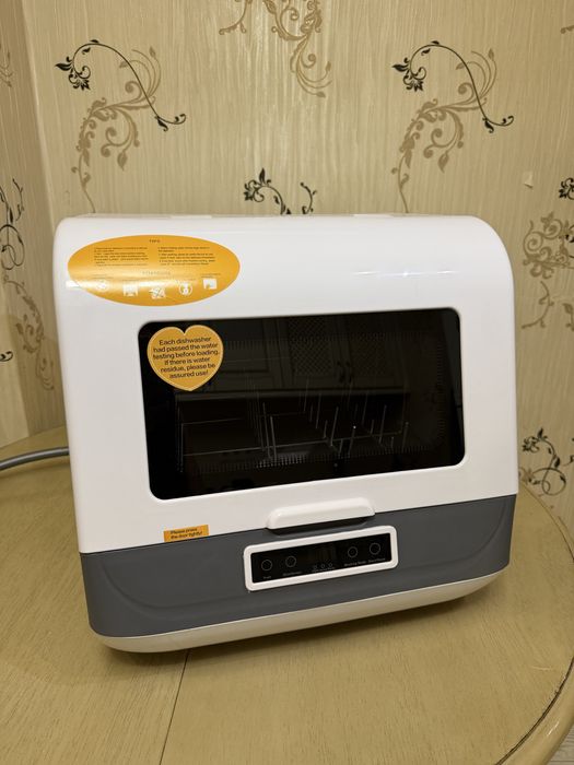 Автоматична посудомийна машина з функцією сушки. Настільна портативна