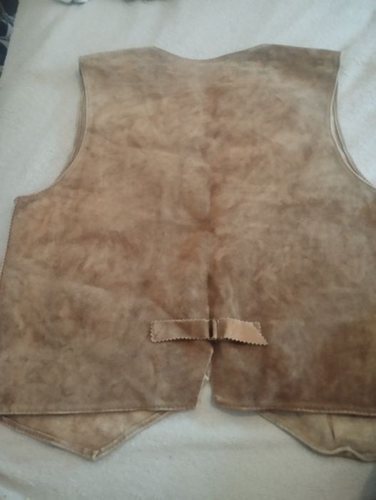 Coleto de pele em ótimo estado