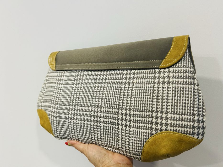 Pochete NOVA da marca ÉMOI. Em tecido com apontamentos em pele