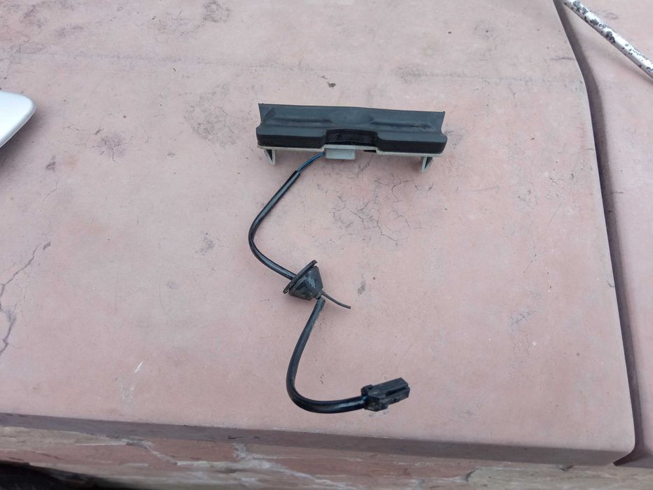 Планка підсвітки номера  кришки багажника Мондео Мк3 1S71-F43400-AW