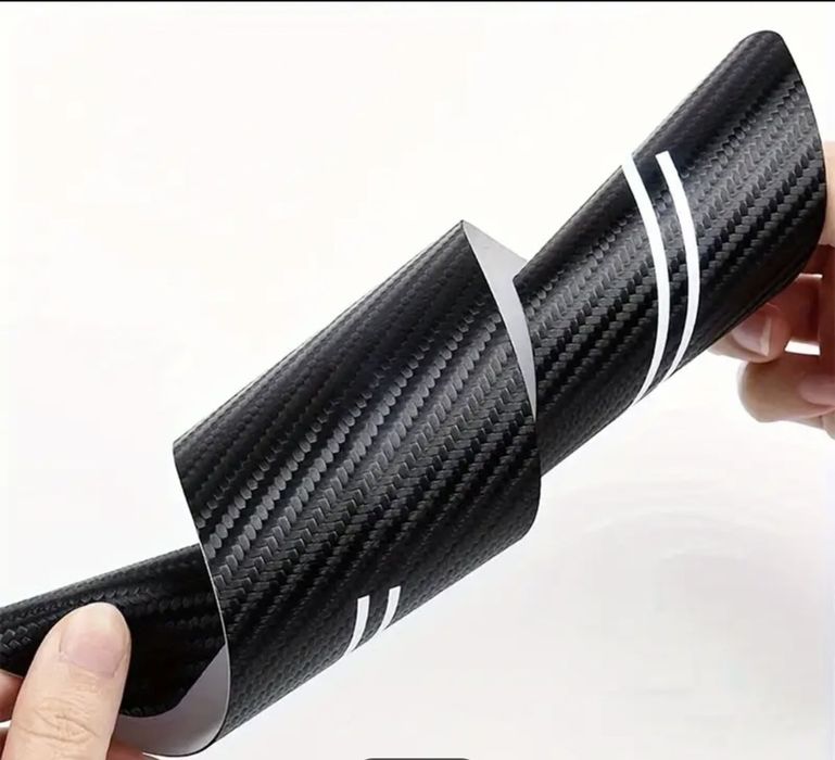 Захисна наклейка на пороги автомобіля Chevrolet Aveoкарбон