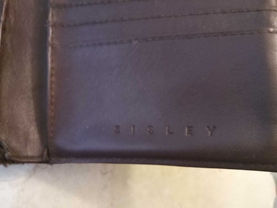 Conjunto da Sisley, carteira,cinto e luvas