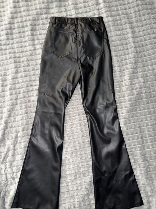 Шкіряні штани клеш на високій посадці