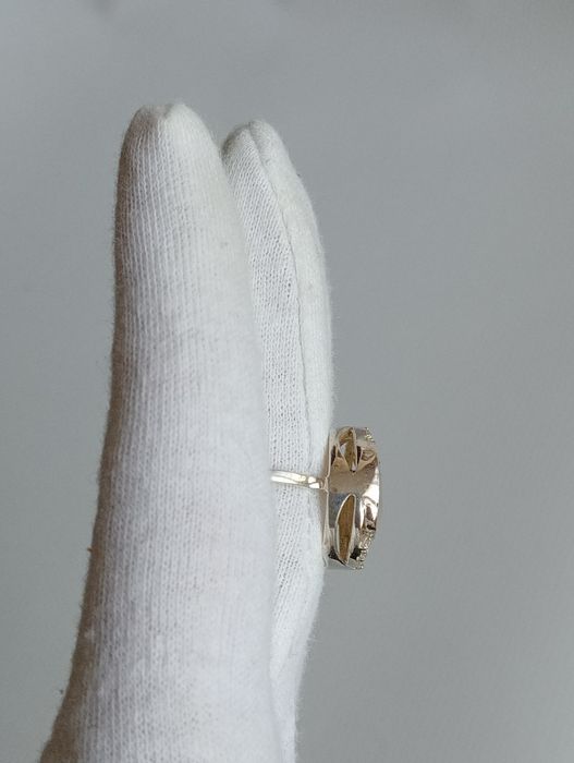 Срібна каблучка з золотими пластинами