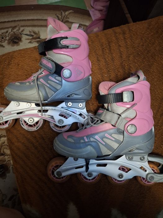 Роликовые коньки