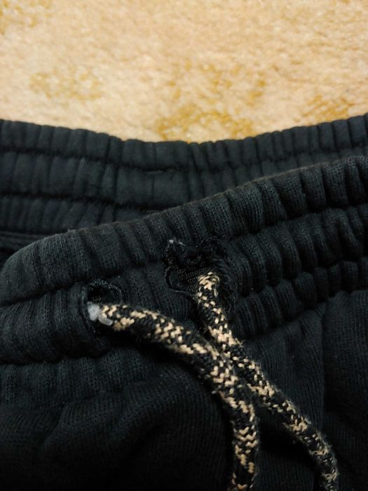 Damskie spodnie dresowe cargo Adidas