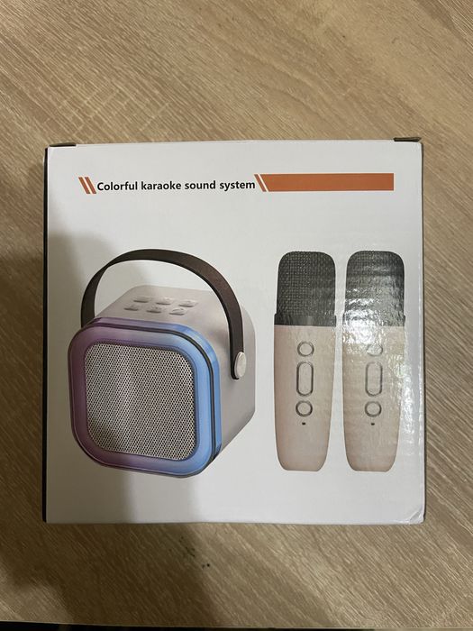 Блутуз колонка с  микрофонами.