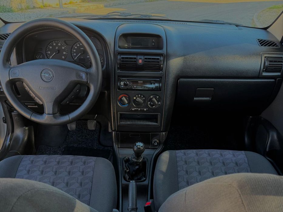 Opel Astra 1.2 gasolina 100.243 km