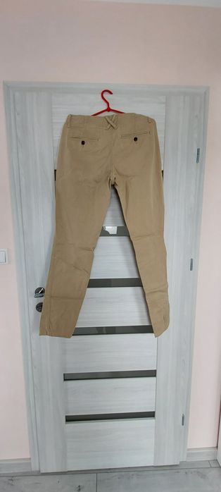 Spodnie beżowe bryczesy unisex L  tommy hilfiger denim z m
