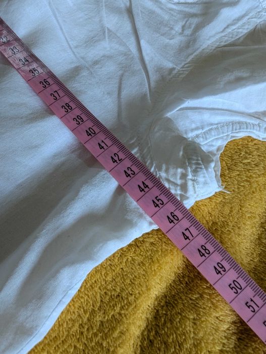 Damska biała koszulka z guziczkami rozmiar S