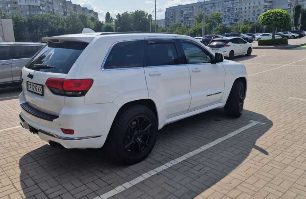 Jeep Grand Cherokee 2015 VIN 1C4RJFCM7FC214884 фото оголошення 4 з 23