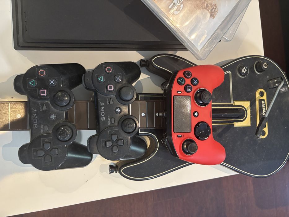 PS4 Pro 1TB com coamdo nacon evolution e 26 jogos