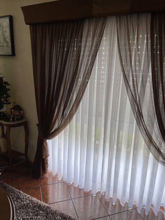 Selling curtains and valances, as shown in the photos.