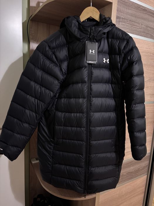 Продам зииню куртку нову .