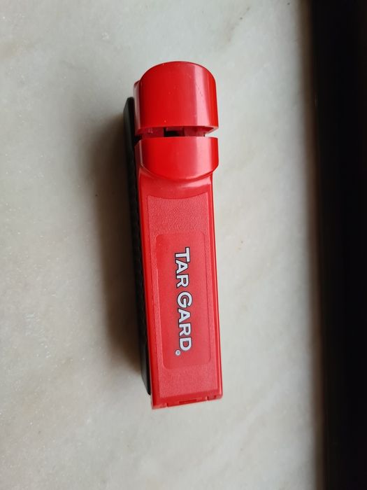 Maquina de fazer cigarros na caixa