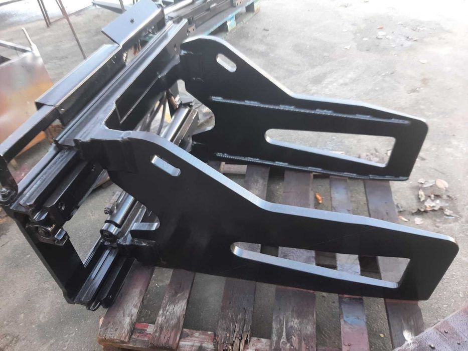 Захват навантажувача для квадратних тюків