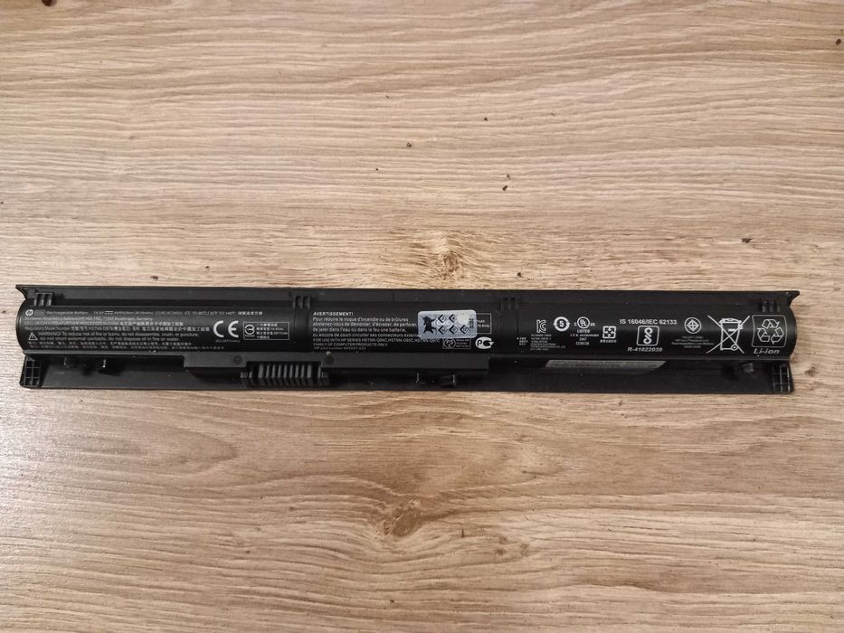 Oryginalna bateria HP RI04 do laptopa - uszkodzona