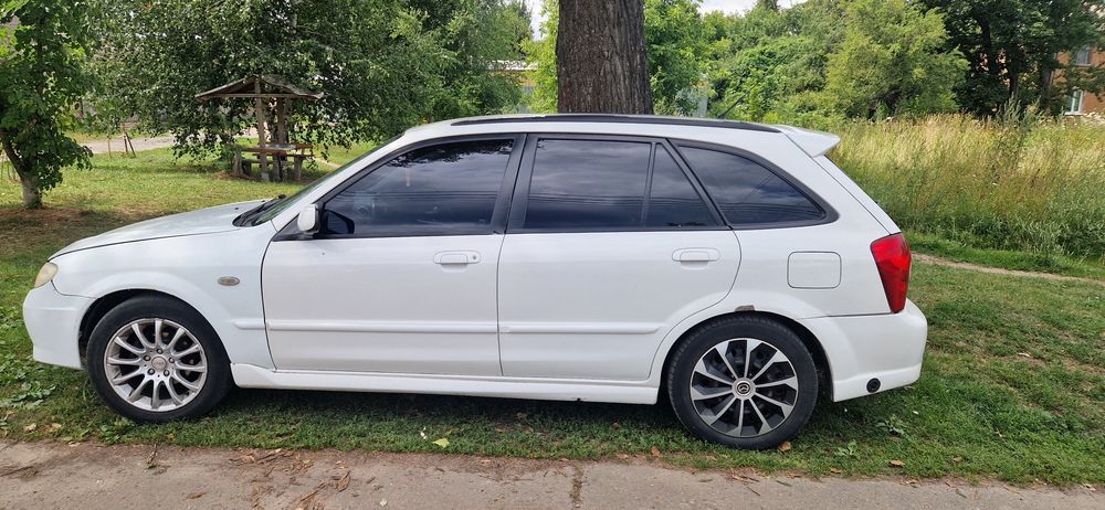 Мазда 323 Protege5 GXI