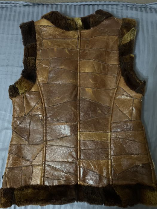 Жіноча шкіряна жилетка