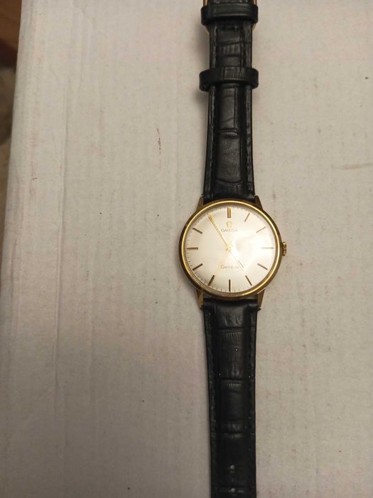 Omega Geneve złoty 18 K zegarek męski