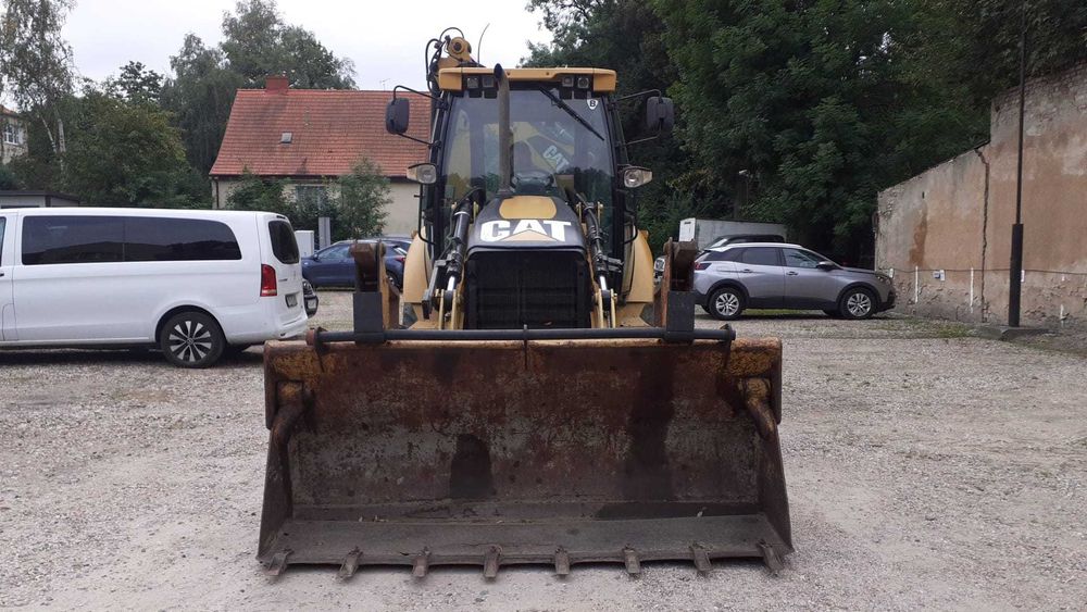 Koparko ładowarka CAT 428E
