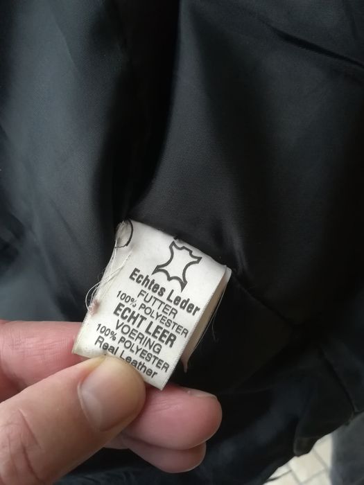 Casaco em pele.. Muito bom