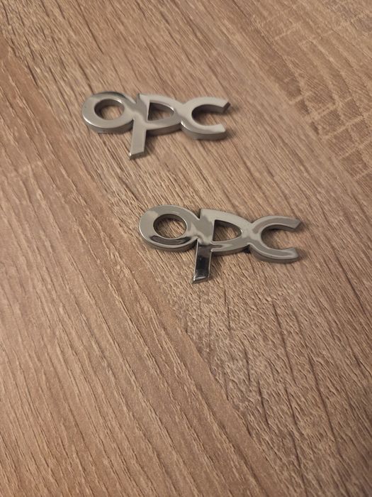 2 Emblemas laterais OPC Originais