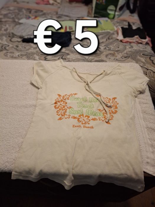 Roupa de criança dos 9 aos 10