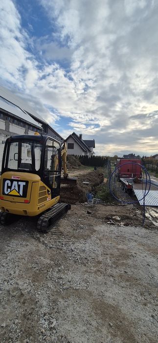 Wynajem minikoparka- młot,  wiertnica 250