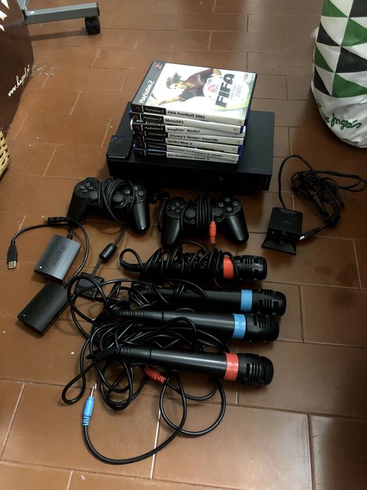 Playstation 2 + cartão memória/jogos/microfone singstar/câmara eye toy