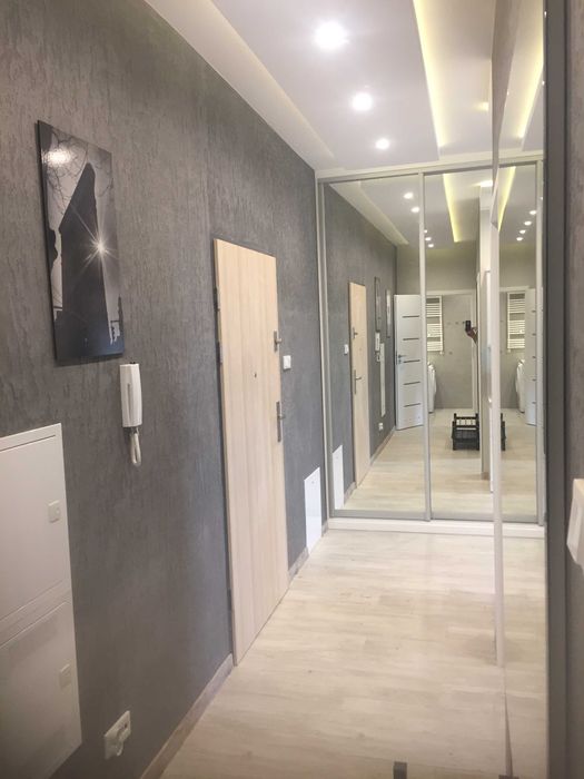 Pokój w apartamentowcu przy UMK