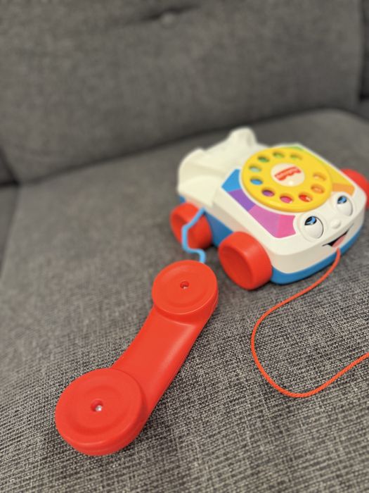 Іграшка каталка Веселий телефон Fisher Price оригінал