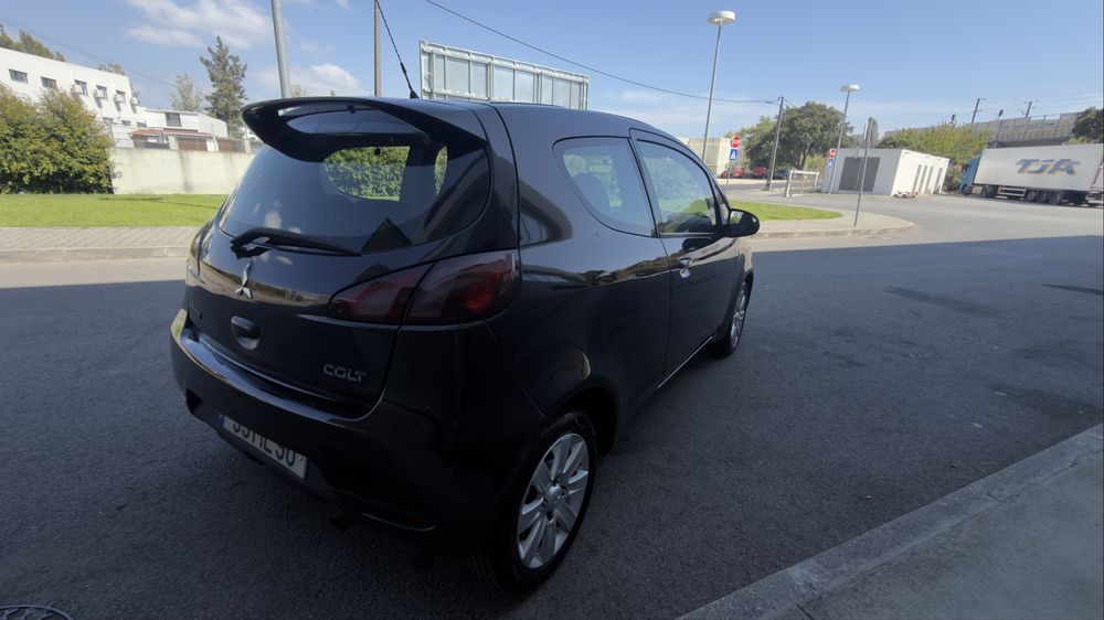 Mitsubishi colt Ar condicionado