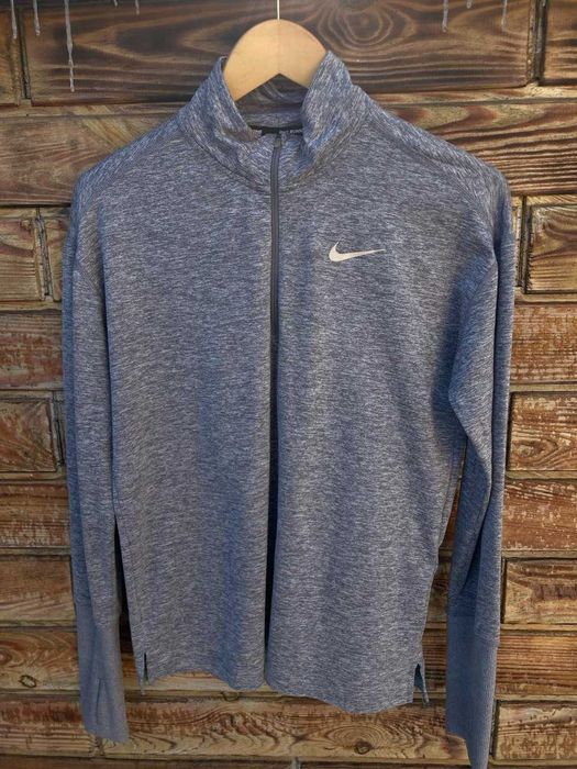 Жіночі сірі спортивні лосини nike