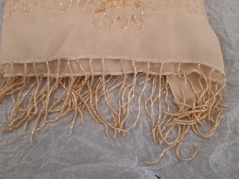 Conjunto de echarpe e bolsa
É nova, mas não se reparou e uma alça teve