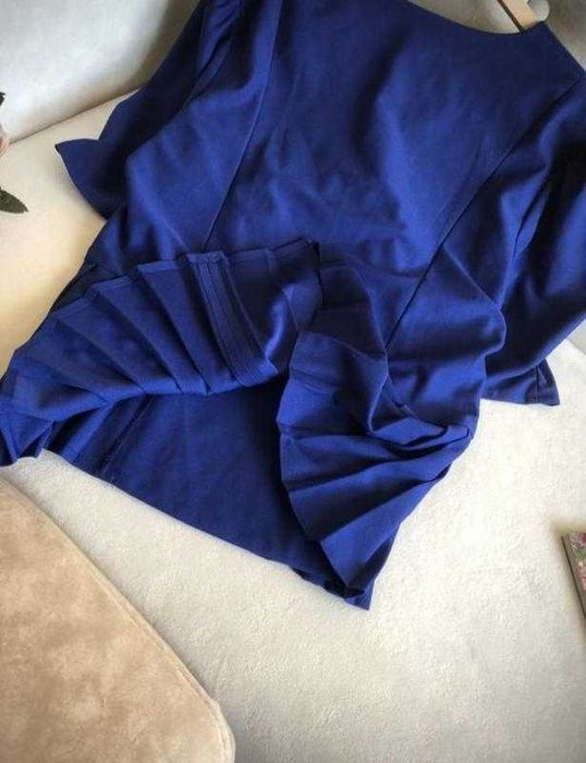 Елегантна блузка-жакет з баскою