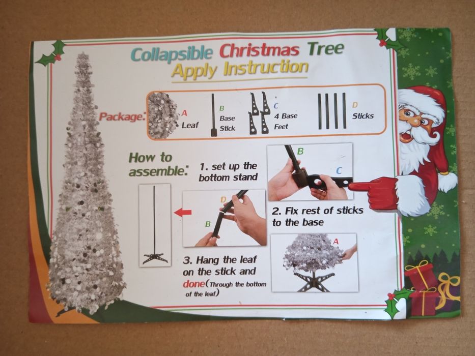 Árvore de Natal pop-up dourada.