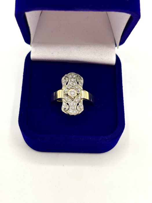 Złoty pierścionek z brylantami 0,31ct