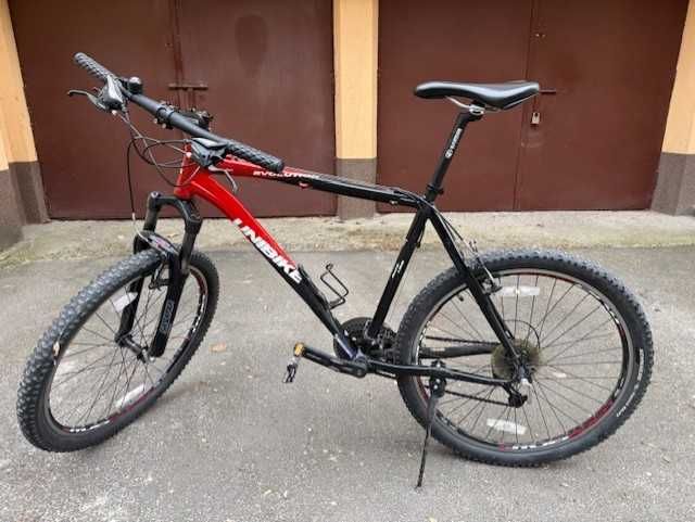 UNIBIKE Evolution; MTB; rama 21; koła 26; przerzutki shimano 3x8