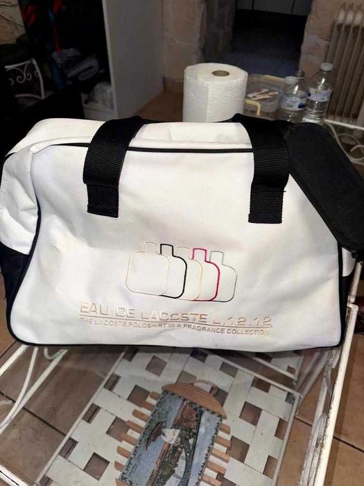 saco lacost original muito bem cuidado