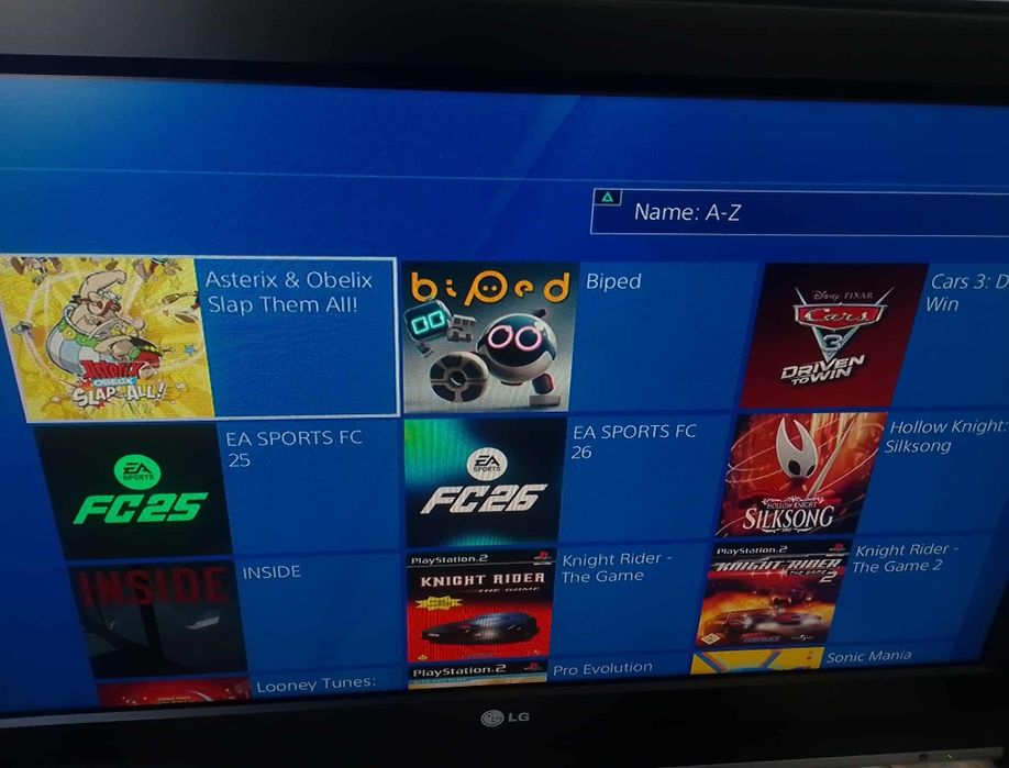 Playstation 4 com 15  jogos pronto a jogar FC26 GTA GOD OF WAR ..