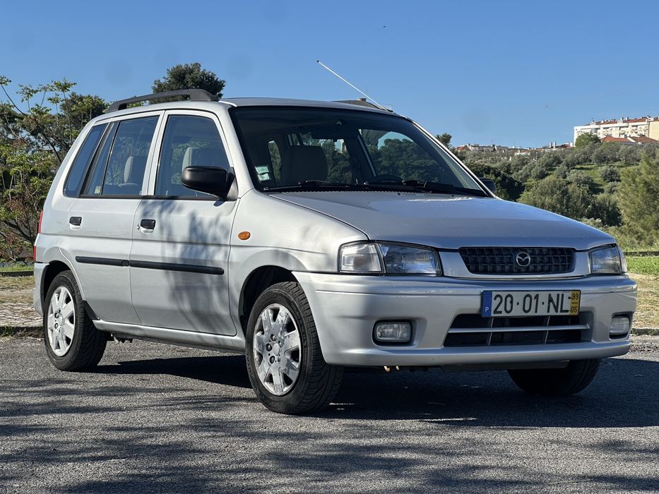 Mazda Demio 1.3 Glx de 1999 a gás